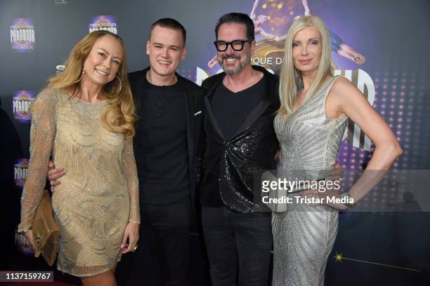 Jenny Elvers and his son Paul Elvers, Alex Jolig and his wife Britt Jolig-Heinz attend the Cirque du Soleil 'Paramour - Das Musical' premiere on...