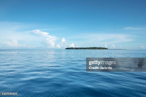 sea with cloud - sea islands stock pictures, royalty-free photos & images