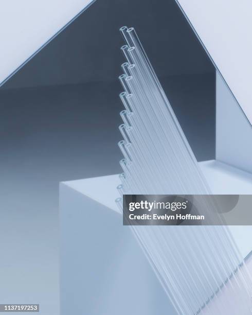 monochromatic blue geometric mirror with straws - pointy architecture stock pictures, royalty-free photos & images