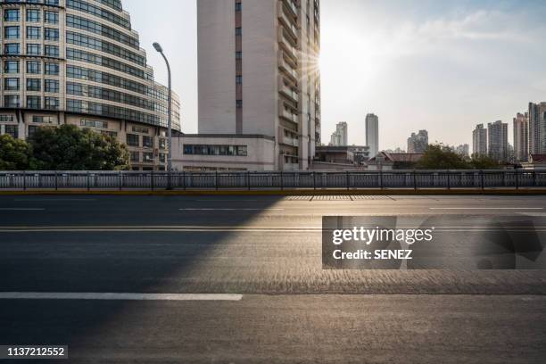 urban road - roadside stock pictures, royalty-free photos & images