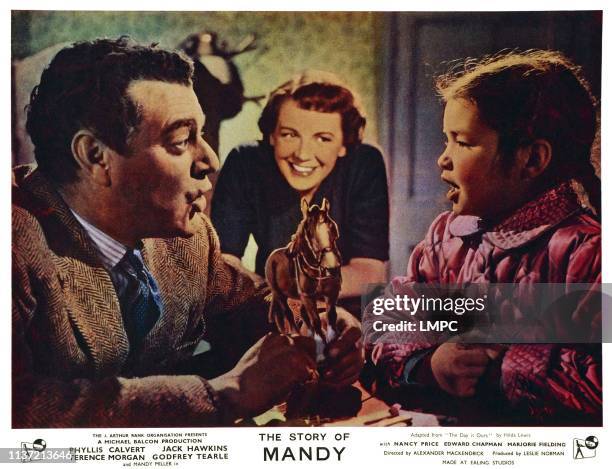 The Story Of Mandy, lobbycard, , British lobbycard, from left: Jack Hawkins, Phyllis Calvert, Mandy Miller, 1952.