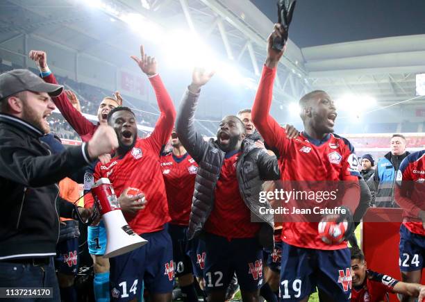 Jonathan Bamba, Jonathan Ikone, Nicolas Pepe of Lille celebrate the victory following the French Ligue 1 match between Lille OSC and Paris...