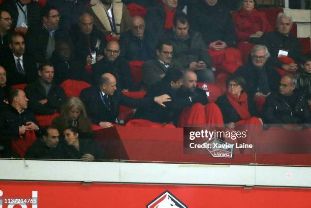 Sporting director Antero Henrique puts a hand on the shoulder of PSG President Nasser Al-Khelaifi who appears to lean over Lille LOSC President...