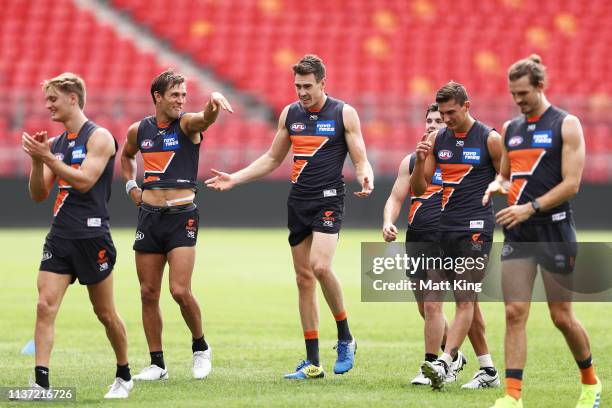 Gws Training Matt de Boer speaks to Jeremy Cameron during a GWS Giants AFL... News ...