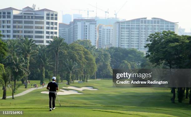 Sanghyun Park of Korea walks down the 13th hole on Day One of the Maybank Championship at Saujana Golf & Country Club, Palm Course on March 21, 2019...