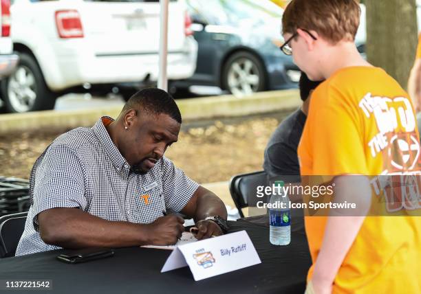 Former Tennessee Volunteers player Billy Ratliff signs autographs before the Orange and White spring game on April 13 at Neyland Stadium in...