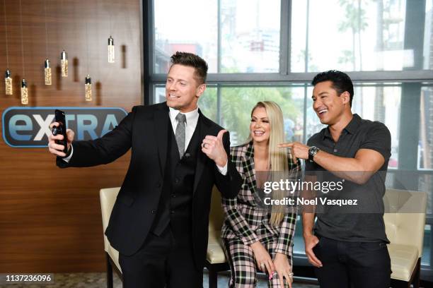 Michael "The Miz" Mizanin, Maryse Ouellet and Mario Lopez visit "Extra" at Universal Studios Hollywood on March 20, 2019 in Universal City,...