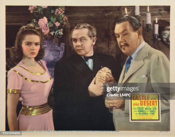 Castle In The Desert, lobbycard, from left: Arleen Whelan, Steven Geray, Sidney Toler, 1942.