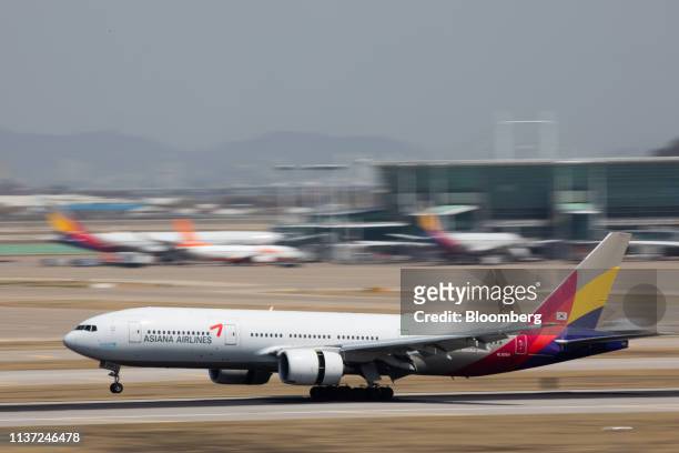 Boeing Co. 777-200 aircraft operated by Asiana Airlines Inc. Lands at Incheon International Airport in Incheon, South Korea, on Monday, April 15,...