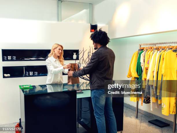 Handing Item Cashier Handing Receipt To Customer Photos and Premium High Res ...