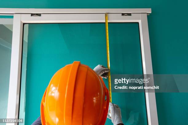the glass technician is installing - replacement stock pictures, royalty-free photos & images
