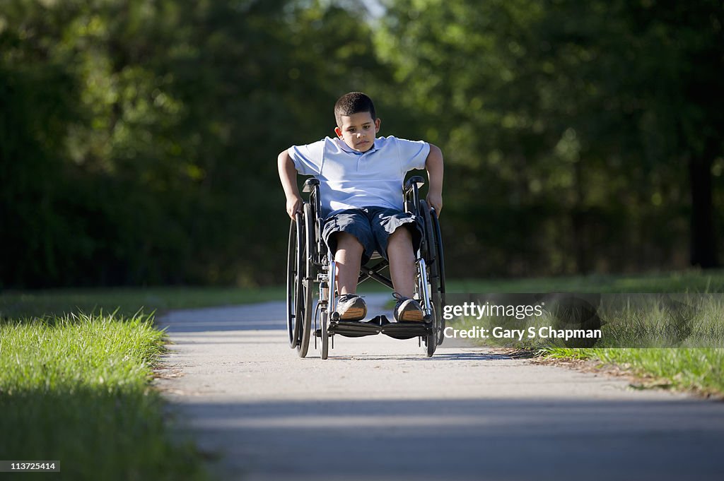 Hispanic boy in wheelchair