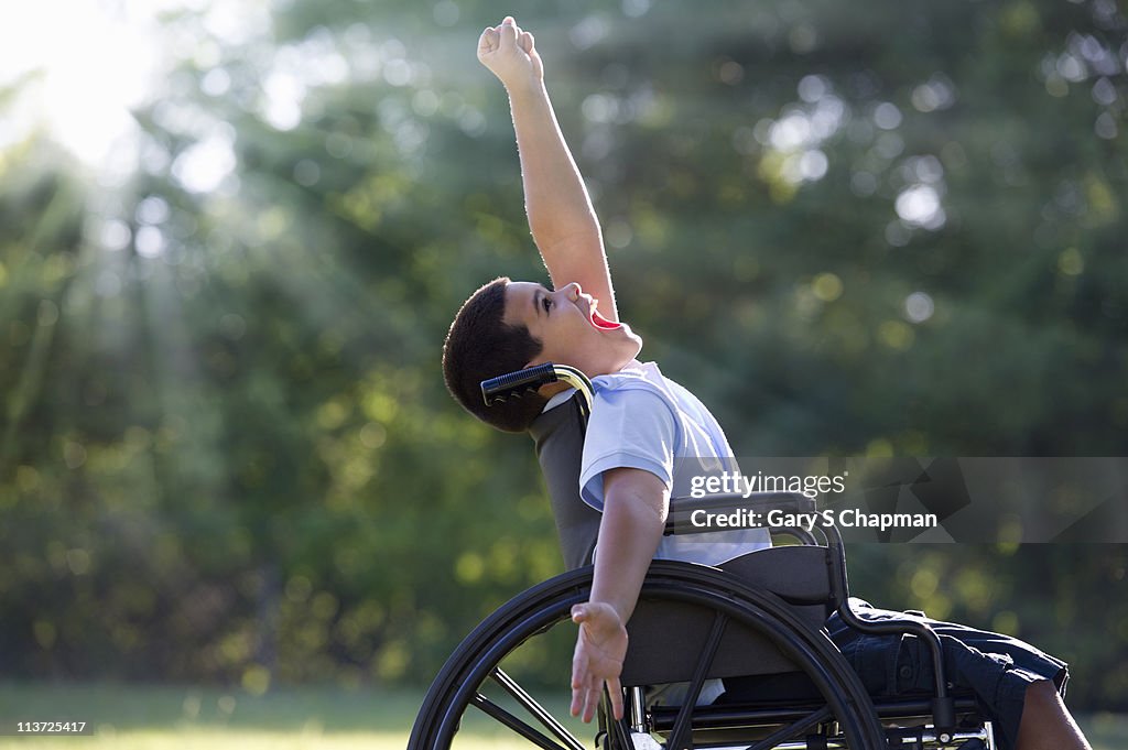 Hispanic boy in wheelchair