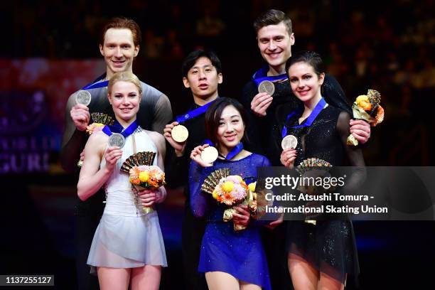 Silver medalists Evgenia Tarasova and Vladimir Morozov of Russia, gold medalists Wenjing Sui and Cong Han of China and bronza medalists Natalia...