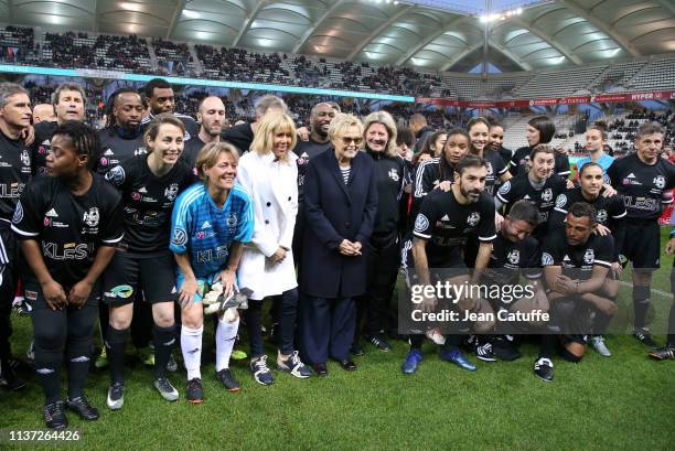 France's First Lady Brigitte Macron, Muriel Robin among Claudia Tagbo, Omar Da Fonseca, Sidney Govou, Frederic Piquionne, Jean-Michel Lesage, Robert...