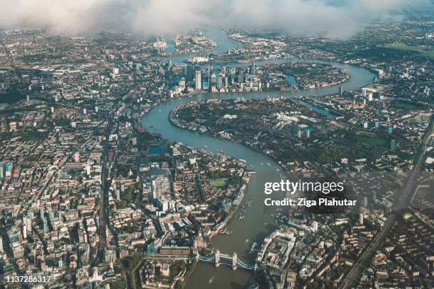 aerial view of river thames in london - airport aerial stock pictures, royalty-free photos & images