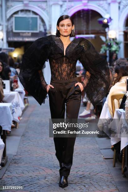 Model walks the runway at the Sudi Etuz show during Mercedes-Benz Istanbul Fashion Week on March 21, 2019 in Istanbul, Turkey.