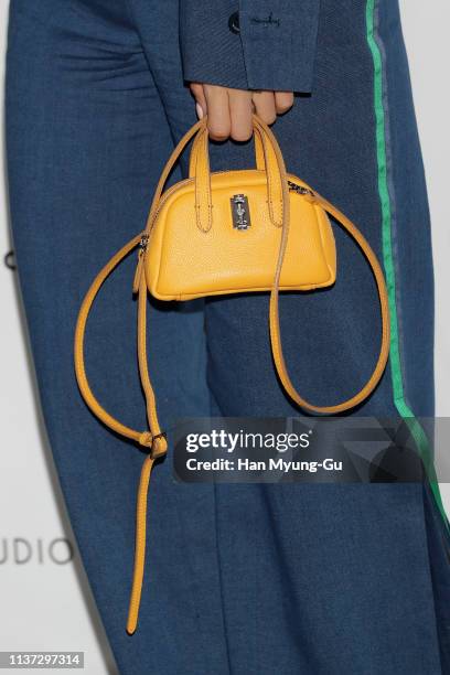 Former member of South Korean girl group T-ara, Eunjung , bag detail, attends the "The Studio K" 2019 FW Collection Photocall on March 21, 2019 in...