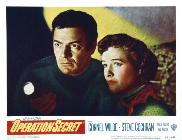 Operation Secret, US lobbycard, from left: Cornel Wilde, Phyllis Thaxter, 1952.