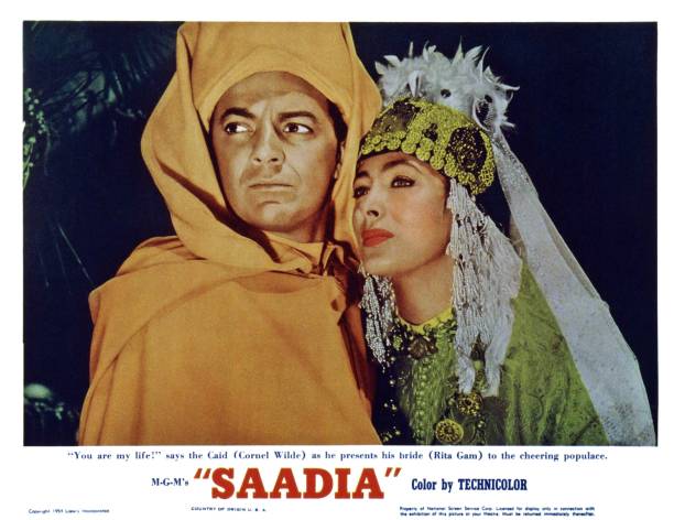 Saadia, US lobbycard, from left: Cornel Wilde, Rita Gam, 1953.