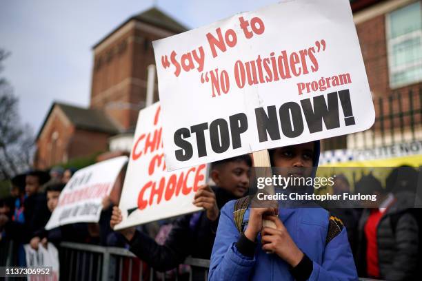 Parents, children and protestors demonstrate against the 'No Outsiders' programme, which teaches children about LGBT rights, at Parkfield Community...