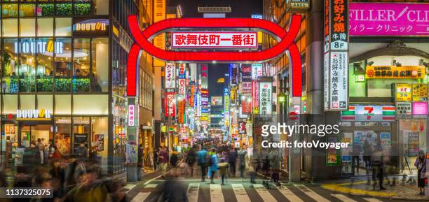 tokyo kabukicho crowds after work neon night district panorama japan - kabuki cho stock pictures, royalty-free photos & images