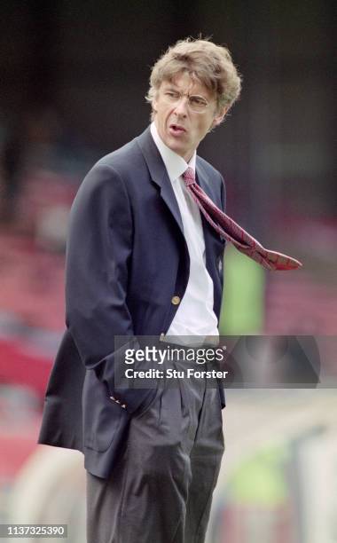 New Arsenal manager Arsene Wenger looks on before the Premier League match against Wimbledon at Selhurst Park on November 2, 1996 in London, United...