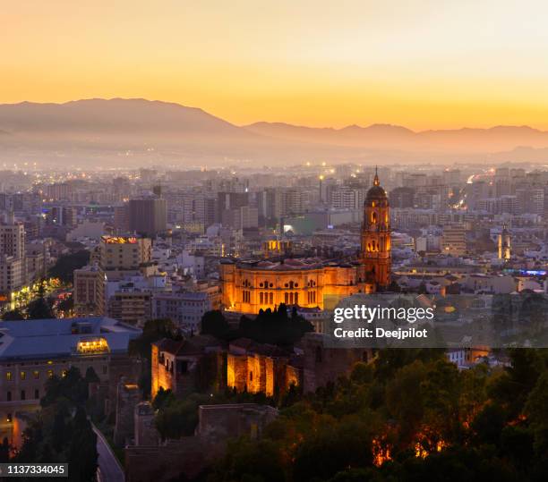 the city of malaga at sunset, andalusia, spain - málaga imagens e fotografias de stock