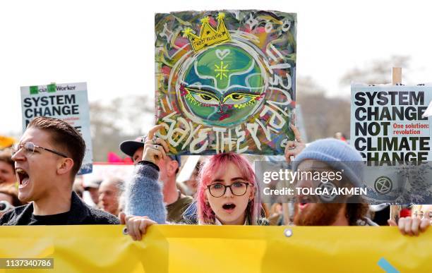 Environmental protesters from the Extinction Rebellion group stage a demonstration in Parliament Square London on April 15, 2019. Environmental...