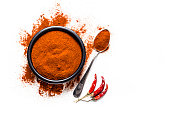 Spices: Red chili pepper powder shot from above on white background