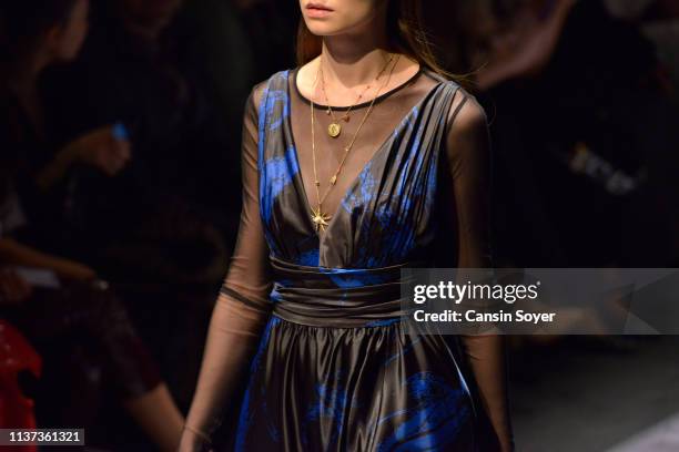 Model, fashion detail, walks the runway at the Meltem Ozbek show during Mercedes-Benz Istanbul Fashion Week at Zorlu Performance Hall on March 21,...