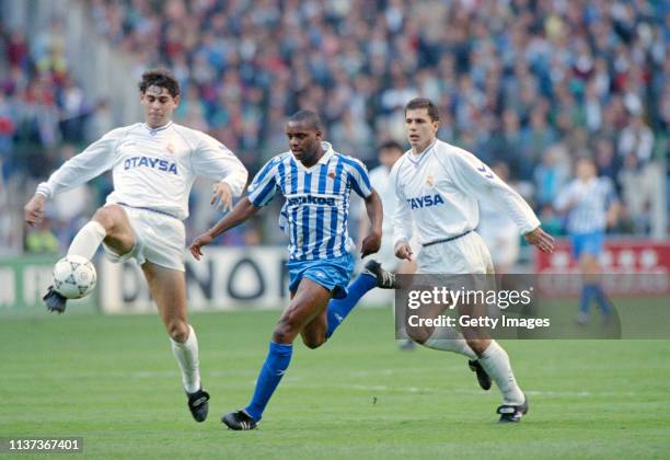 Fernando Hierro and Jesus Solana battle for the ball with Real Sociedad striker Dalian Atkinson during a match at the Bernabeu between Real Madrid...