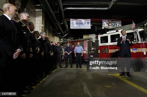 President Barack Obama speaks to firefighters at the headquarters of Engine Company 54, Ladder Company 4 and Battalion 9, in New York, U.S., on...