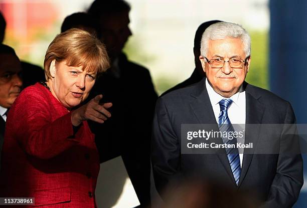 German Chancellor Angela Merkel and Palestinian Authority President Mahmoud Abbas arrive for a press conference at the Chancellery on May 5, 2011 in...