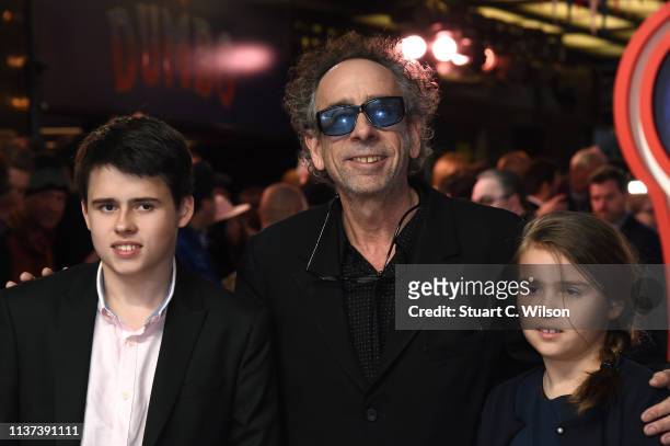 Director Tim Burton, with children Billy and Nell attend the 'Dumbo' European premiere at The Curzon Mayfair on March 21, 2019 in London, England.
