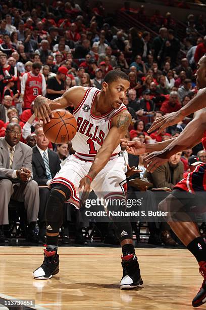 Chicago Bulls point guard Derrick Rose protects the ball in Game Two of the Eastern Conference Semifinals against the Atlanta Hawks during the 2011...