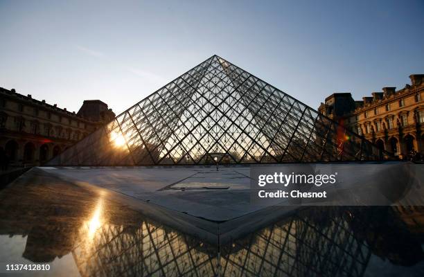 The Louvre Pyramid and the Louvre museum are seen on March 21, 2019 in Paris, France. The pyramid of the Louvre Museum celebrates its 30th...