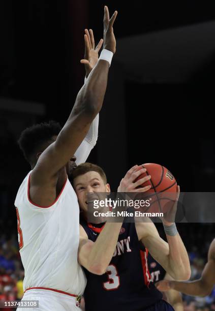 Dylan Windler of the Belmont Bruins dribbles the ball against Bruno Fernando of the Maryland Terrapins in the second half during the first round of...