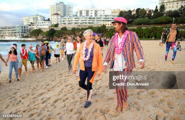 Dr Kerryn Phelps chats with OneWave founder Grant Treblico on the Bondi Beach shoreline on March 22, 2019 in Sydney, Australia. Surfers gather to...