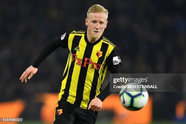 Watford's English midfielder Will Hughes chases the ball during the English Premier League football match between Watford and Arsenal at Vicarage...