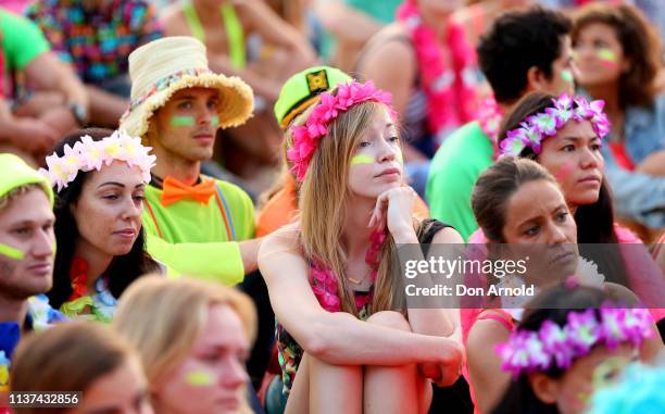 People look on solemnly as One Wave founder Grant Treblico addresses the crowd on March 22, 2019 in Sydney, Australia. Surfers gather to celebrate...