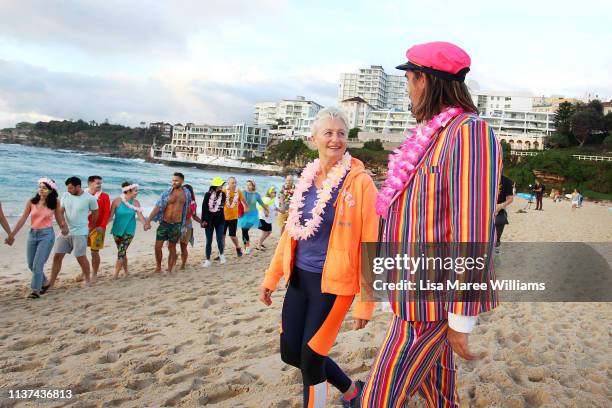 Dr Kerryn Phelps speaks with OneWave founder Grant Trebilco at Bondi Beach on March 22, 2019 in Sydney, Australia. Surfers gather to celebrate five...