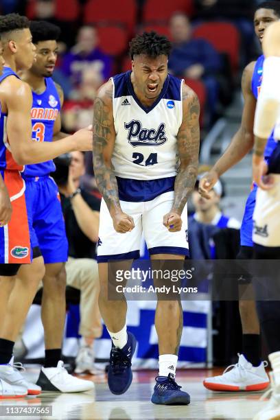Jordan Caroline of the Nevada Wolf Pack celebrates the play against the Florida Gators in the first half during the first round of the 2019 NCAA...