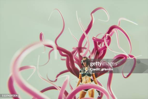 futuristic cyborg with lashing tentacles - tentacle stock pictures, royalty-free photos & images