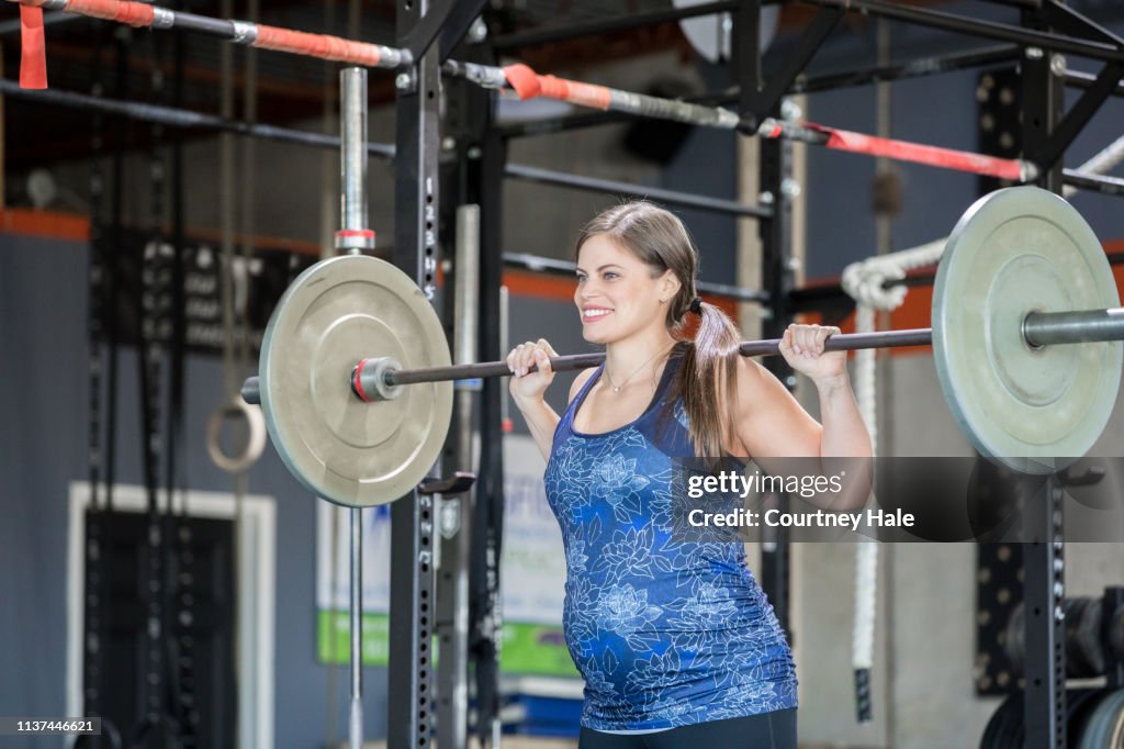 Illustration of Pregnant Women Lifting Weights Deadlifts