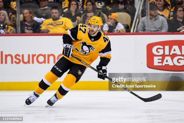 Pittsburgh Penguins Left Wing Adam Johnson skates during the third period in the NHL game between the Pittsburgh Penguins and the Nashville Predators...