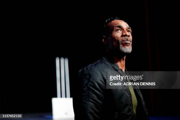 Former England cricketer Chris Lewis poses for a photograph at The Haymarket theatre in Basingstoke on April 10, 2019. - Chris Lewis's journey from...