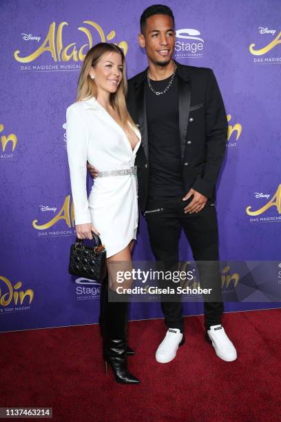 Soccer player VfB Stuttgart and his wife Ina Aogo during the premiere of the musical "Aladdin" at Stage Apollo Theater on March 21, 2019 in...