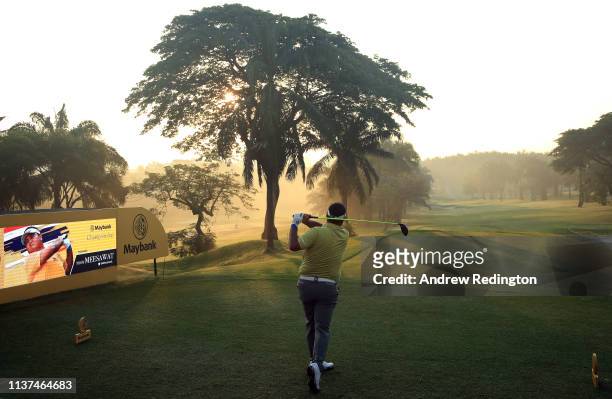 Prom Meesawat of Thailand hits his tee-shot on the tenth hole on Day Two of the Maybank Championship at at Saujana Golf & Country Club, Palm Course...