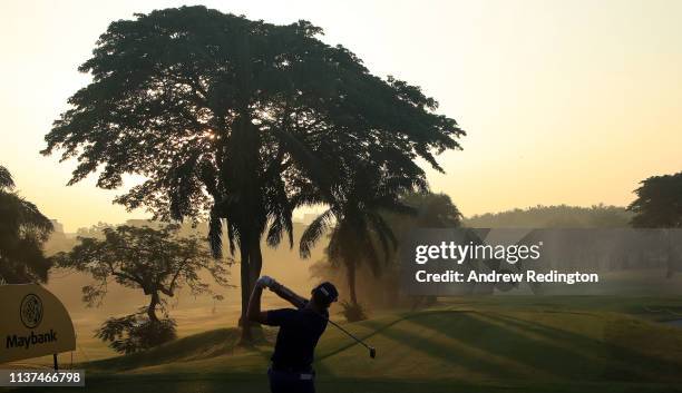 Berry Henson of the USA hits his tee-shot on the tenth hole on Day Two of the Maybank Championship at at Saujana Golf & Country Club, Palm Course on...